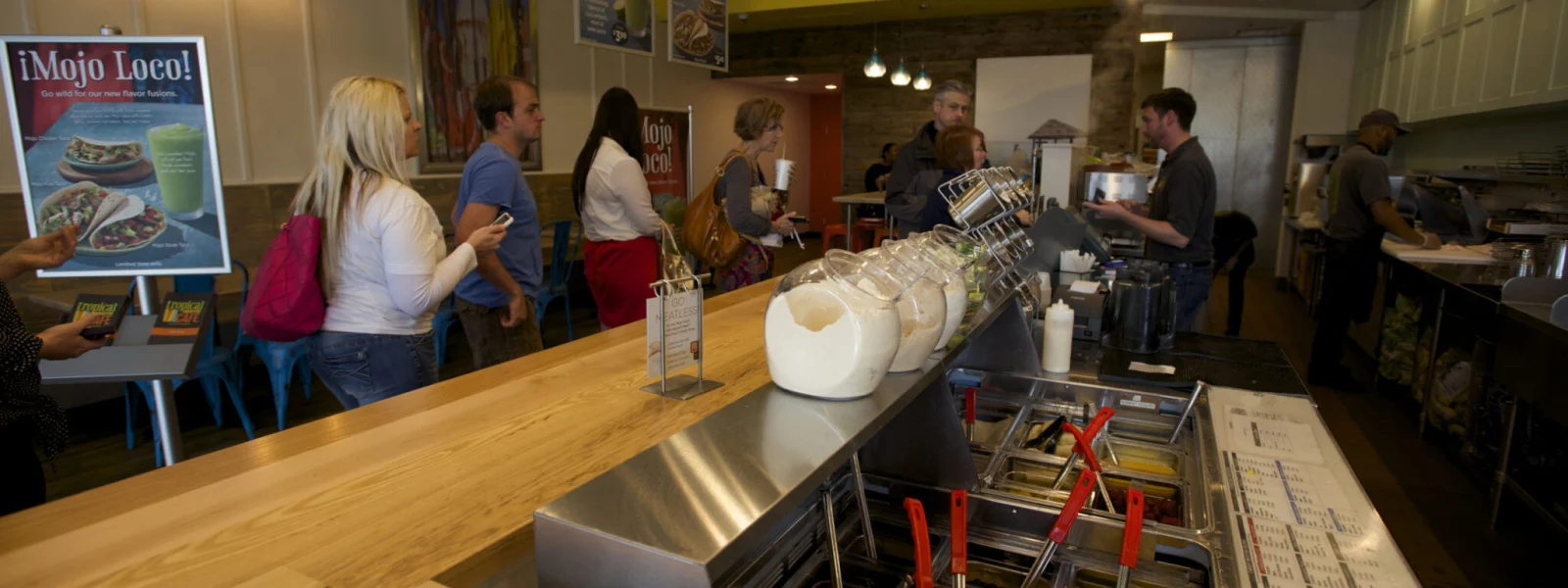 Customers at smoothie bar