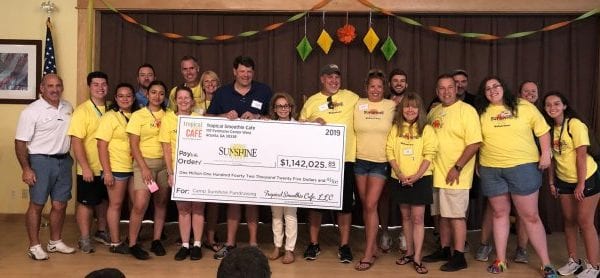 Check presentation with Tropical Smoothie Cafe at Camp Sunshine