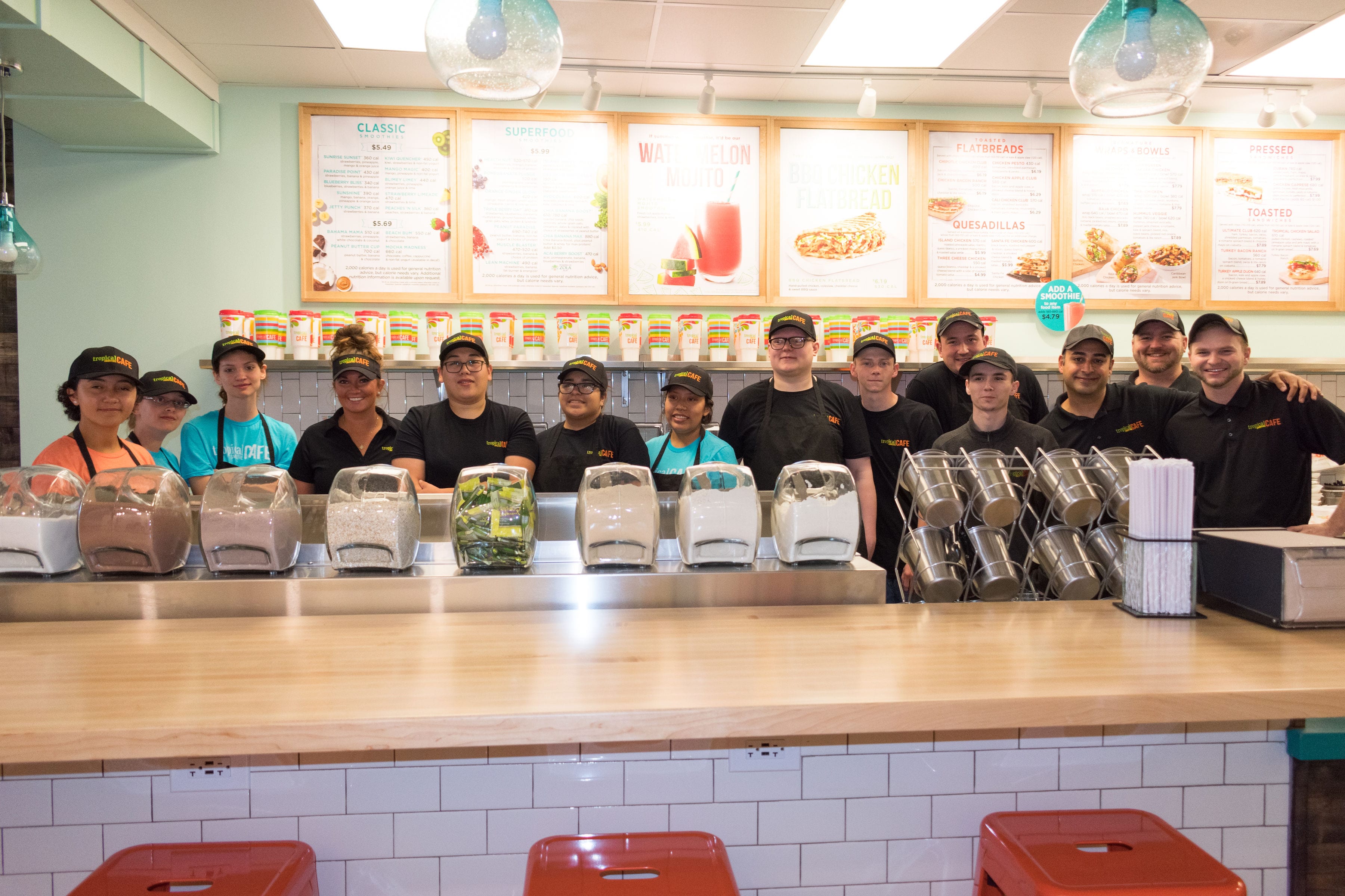 Staff inside a newly opened Tropical Smoothie Cafe