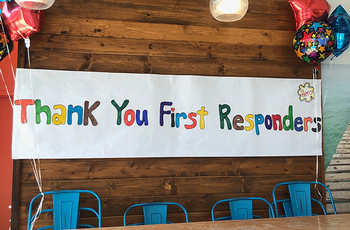 Handmade sign saying "Thank You First Responders"