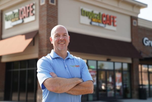 Franchise Owner Mike Haines in front of his Tropical Smoothie Cafe