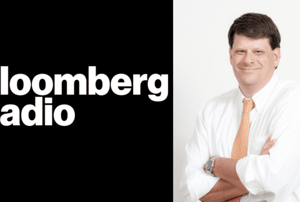 Bloomberg Radio logo split screen with Charles Watson headshot