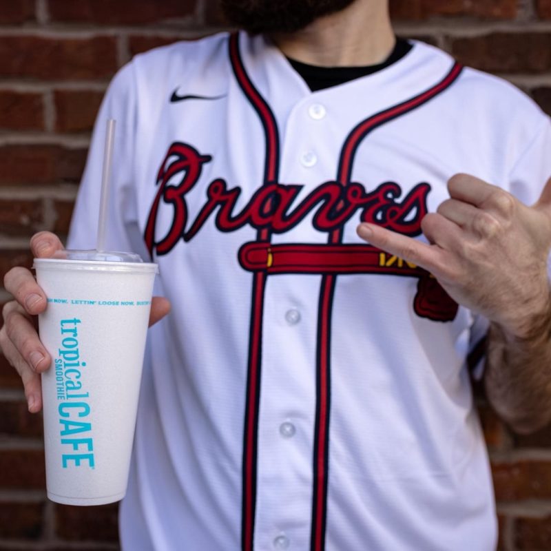 Atlanta Braves player enjoying a Tropical Smoothie Cafe Smoothie